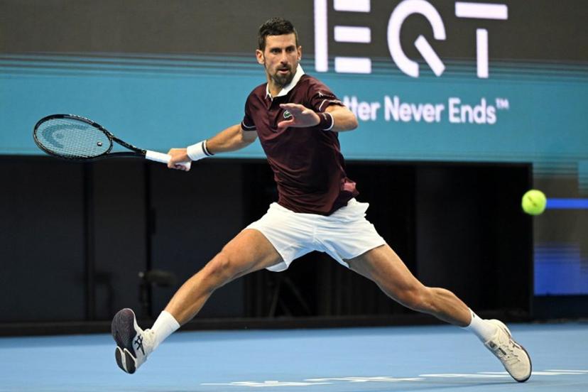 Serbia's Novak Djokovic hits a return to Australia's Alex de Minaur during the men's singles final at the China Open tennis tournament in Beijing on October 6, 2026.  Greg Baker / AFP