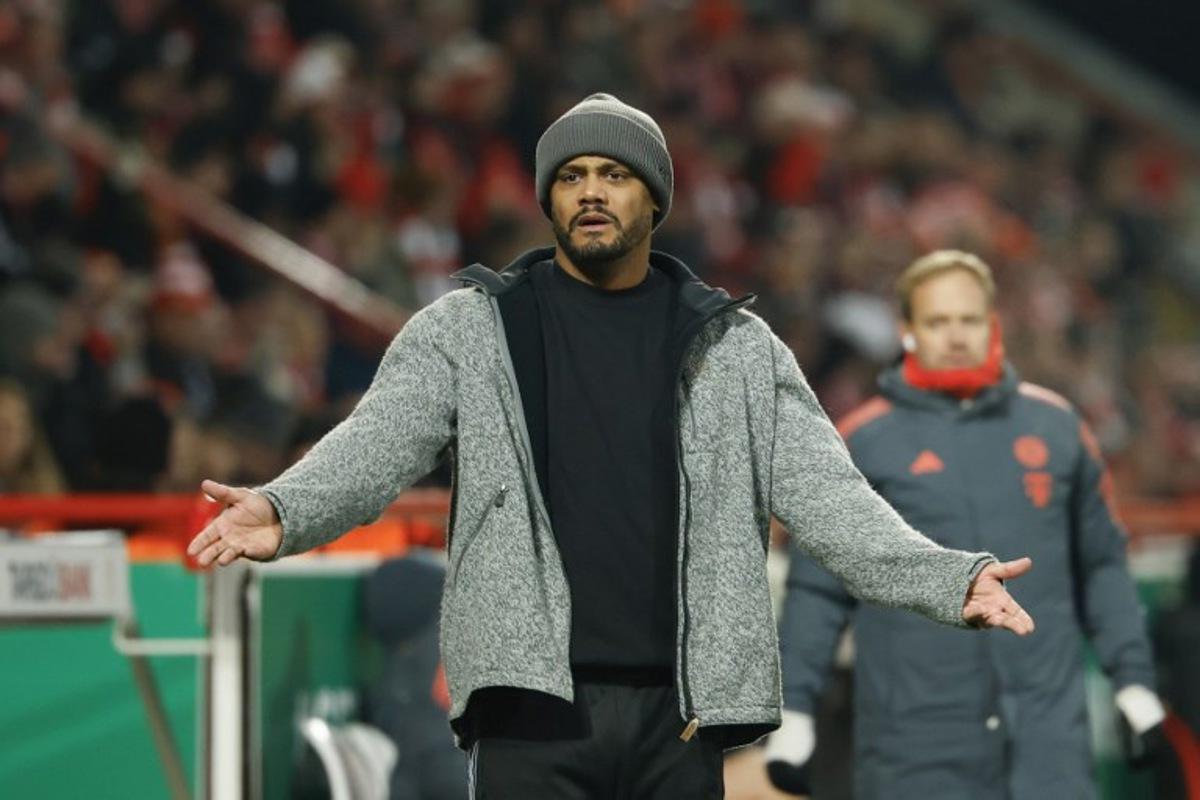 Bayern Munich's Belgian head coach Vincent Kompany reacts during the German Cup (DFB-Pokal) round of 16 football match between 1 FC Union Berlin and FC Bayern Munich in Berlin on December 3, 2025.  Odd ANDERSEN / AFP