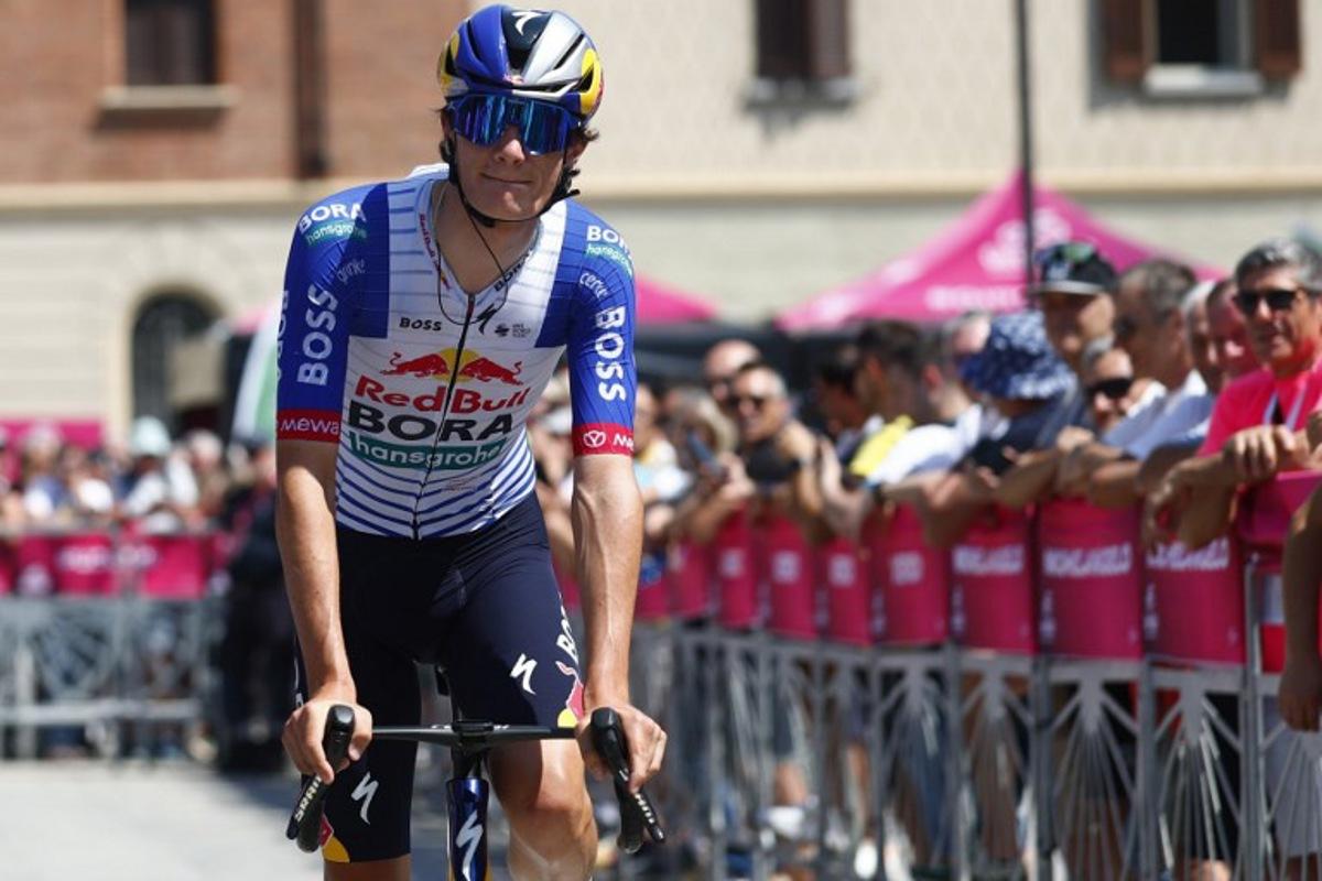 Red Bull - BORA - hansgrohe Italian rider Giulio Pellizzari arrives at the presentation prior the 17th stage of the Giro d'Italia 2026 - Tour of Italy cycling race between Cassano d'Adda and Andalo, Italy, on May 27, 2026.  Luca Bettini / AFP
