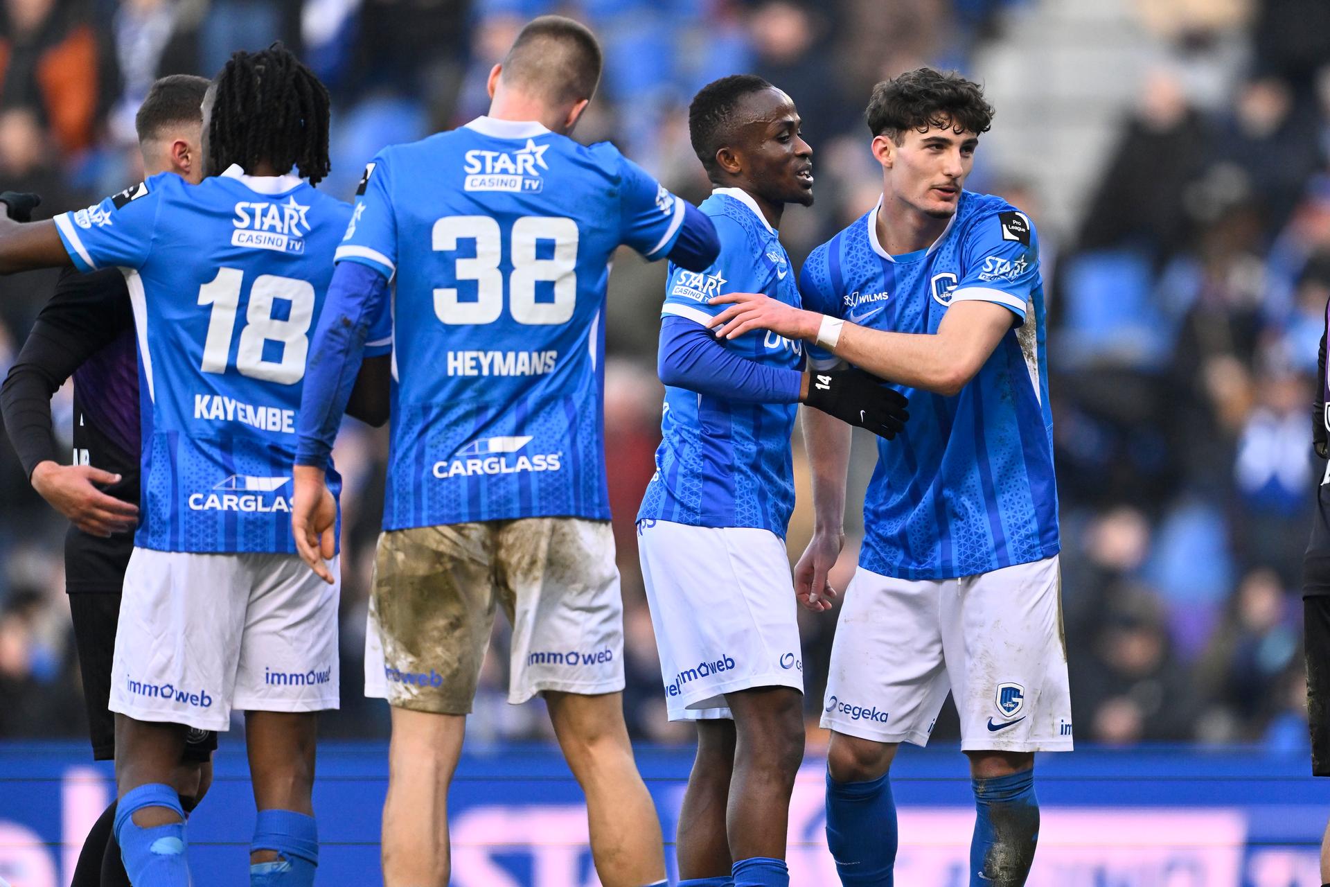 Genk's Yira Sor and Genk's Robin Mirisola celebrate after winning a soccer match between KRC Genk and RSC Anderlecht, Sunday 08 February 2026 in Genk, a game of day 24 of the 2025-2026 'Jupiler Pro League' first division of the Belgian championship. BELGA PHOTO JOHAN EYCKENS