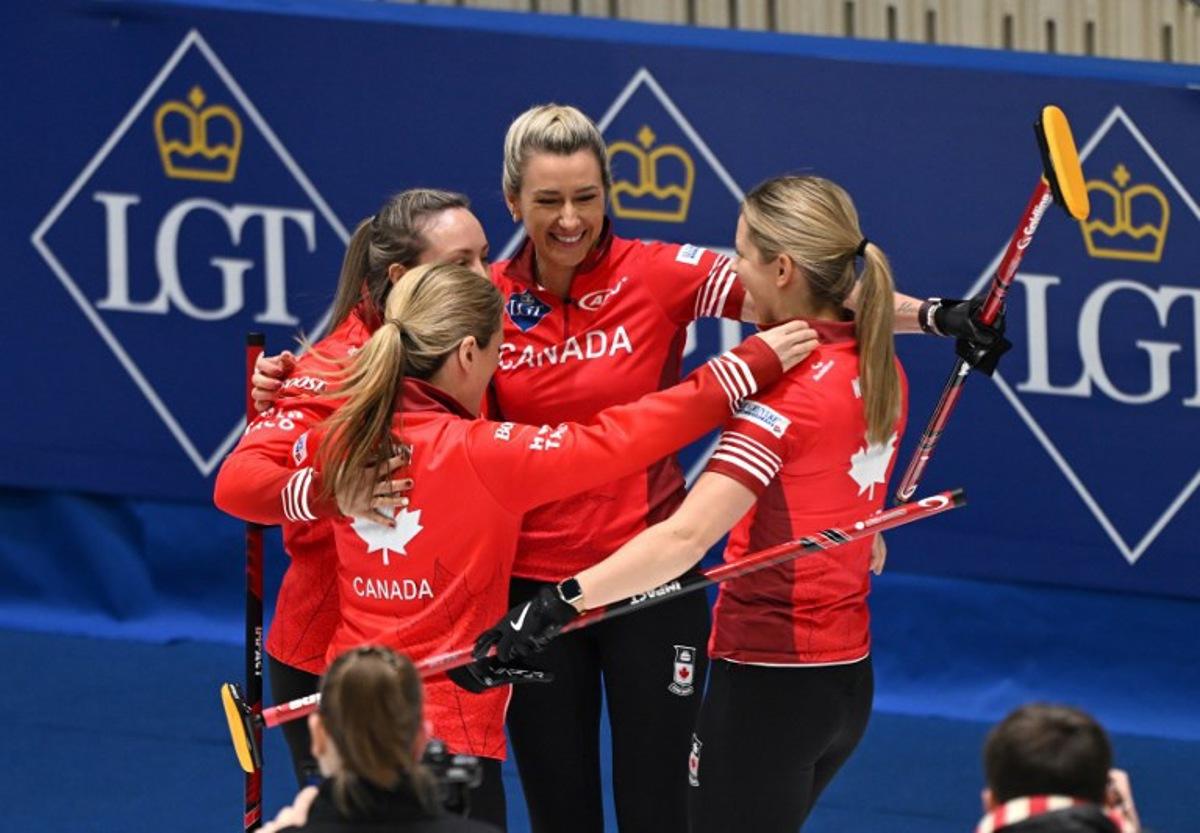 Canada's Rachel Homan (L) and her teammates celebrate their victory after the semi-final match between South Korea and Canada at the World Women's Curling Championship in Uijeongbu on March 22, 2025. Jung Yeon-je / AFP