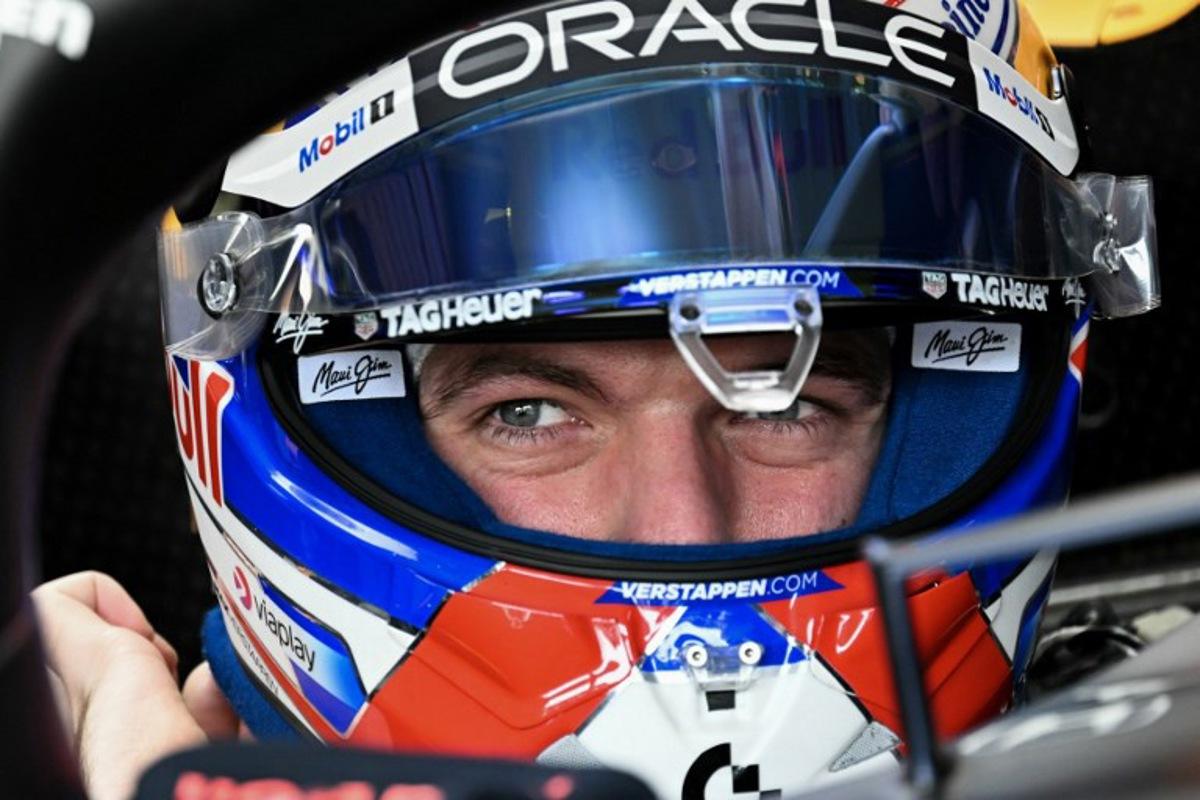 Red Bull Racing's Dutch driver Max Verstappen gets into his car in the garage before the start of the 2025 Miami Formula One Grand Prix at Miami International Autodrome in Miami Gardens, Florida, on May 4, 2025.   Chandan Khanna / AFP