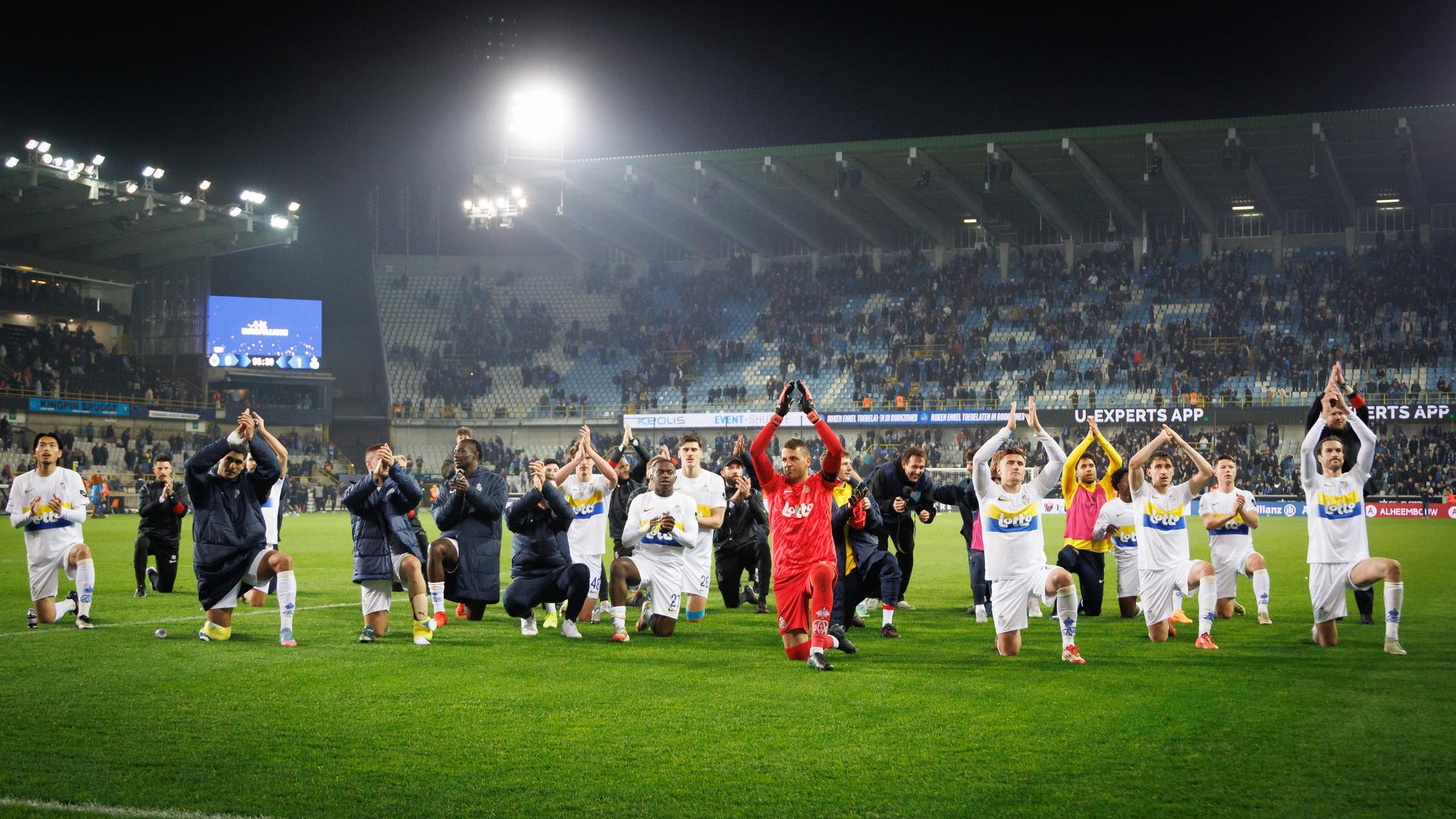 Union's players celebrate after winning a soccer match between Club Brugge and Royale Union Saint-Gilloise, Thursday 24 April 2025 in Brugge, on day 5 (out of 10) of the Champions' Play-offs of the 2024-2025 'Jupiler Pro League' first division of the Belgian championship. BELGA PHOTO KURT DESPLENTER