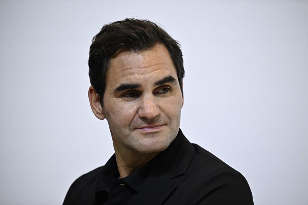 Swiss former tennis player Roger Federer an UNIQLO brand embassador attends the press conference for the 40th anniversary of Japanese ready-to-wear brand UNIQLO in Paris on September 30, 2024.  JULIEN DE ROSA / AFP