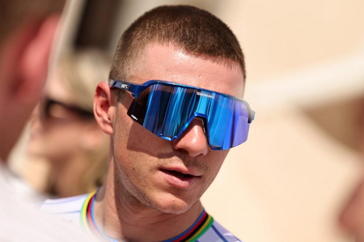 Red Bull-Bora-Hansgrohe's Belgian rider Remco Evenepoel looks on before the sixth stage of the UAE Tour cycling event from al-Ain Museum to Jebel Hafeet in Abu Dhabi on February 21, 2026.  Fadel SENNA / AFP