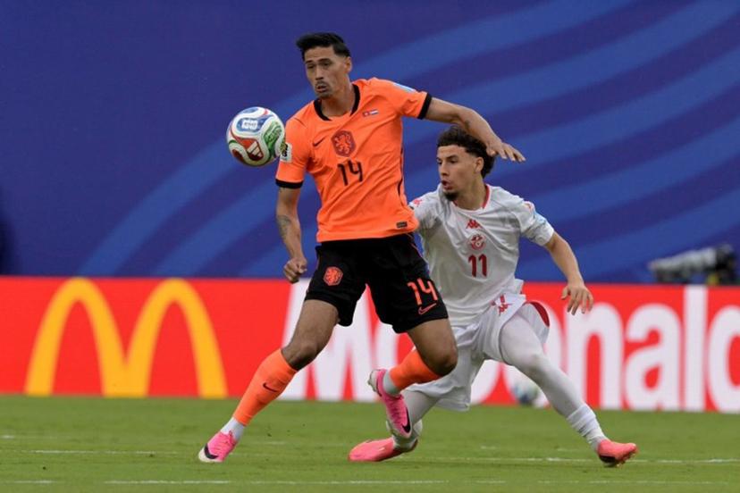 Netherlands' midfielder #14 Tijjani Reijnders and Tunisia's midfielder #11 Ismael Gharbi fight for the ball during the 2026 World Cup Group F football match between Tunisia and the Netherlands at the Kansas City Stadium in Kansas City on June 25, 2026.   Juan MABROMATA / AFP