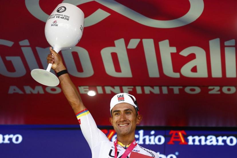 UAE Team Emirates - XRG Ecuadorian rider Jhonatan Narvaez poses on the podium after winning the 4th stage of the Giro d'Italia 2026 - Tour of Italy cycling race between Catanzaro and Cosenza, Italy, on May 12, 2026.  Luca Bettini / AFP