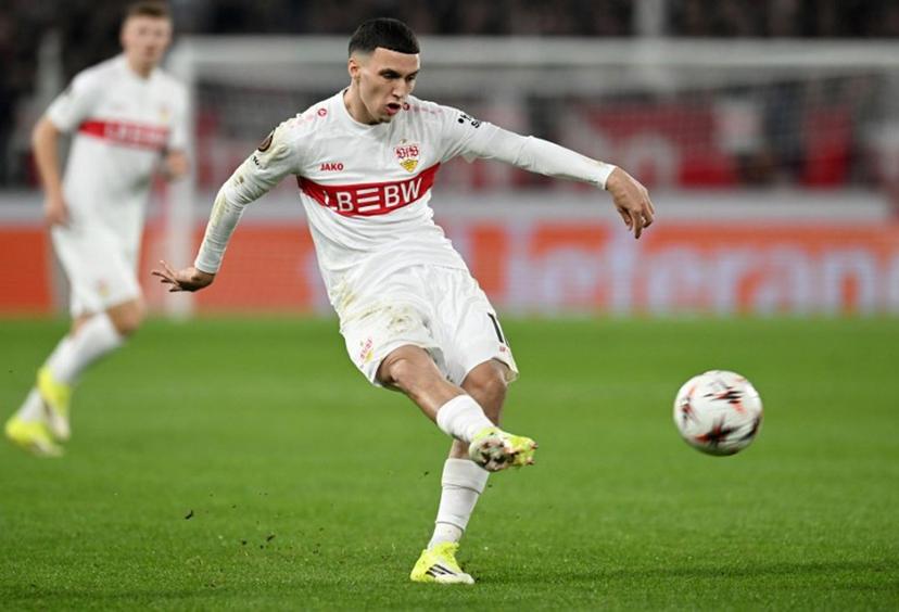 Stuttgart's German-Marrocan forward #11 Bilal El Khannouss kicks the ball during the UEFA Europa League - Last 16 - first leg football match VfB Stuttgart v FC Porto in Stuttgart, southern Germany, on March 12, 2026.   THOMAS KIENZLE / AFP