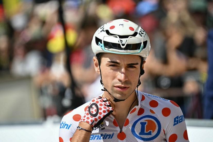 Bahrain - Victorious team's French rider Lenny Martinez wearing the best climber's polka dot (dotted) jersey awaits the start of the 18th stage of the 112th edition of the Tour de France cycling race, 171.5 km between Vif and Courchevel Col de la Loze, in the Alps, southeastern France, on July 24, 2025.  Loic VENANCE / AFP