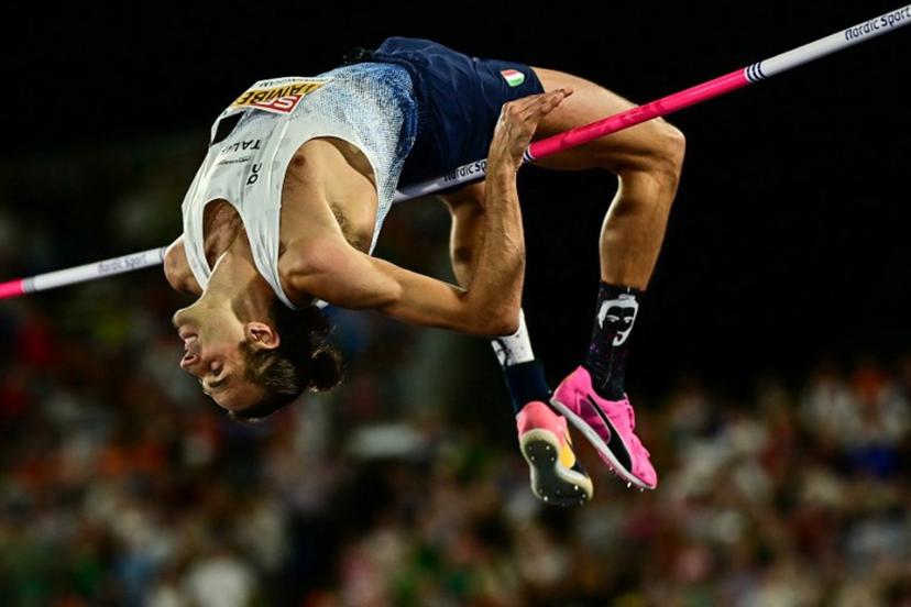 Italy's Gianmarco Tamberi competes in the men's high jump final during the European Athletics Championships at Alexander Stadium in Birmingham on August 14, 2026.  Ben STANSALL / AFP