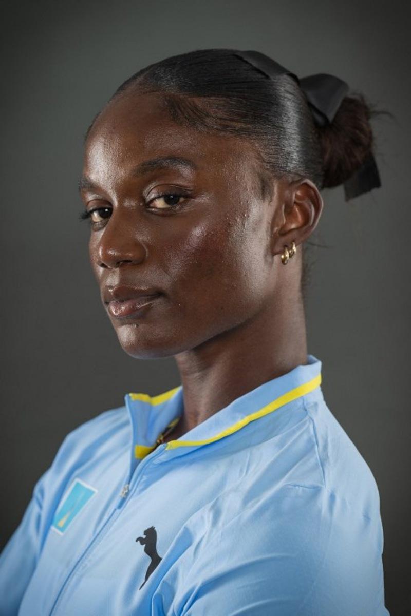 Bronze medallist in the 100m women's event Saint Lucia's Julien Alfred poses for portraits during a studio photo session on the sidelines of the World Athletics Championships in Tokyo on September 15, 2025.  Andrej ISAKOVIC / AFP