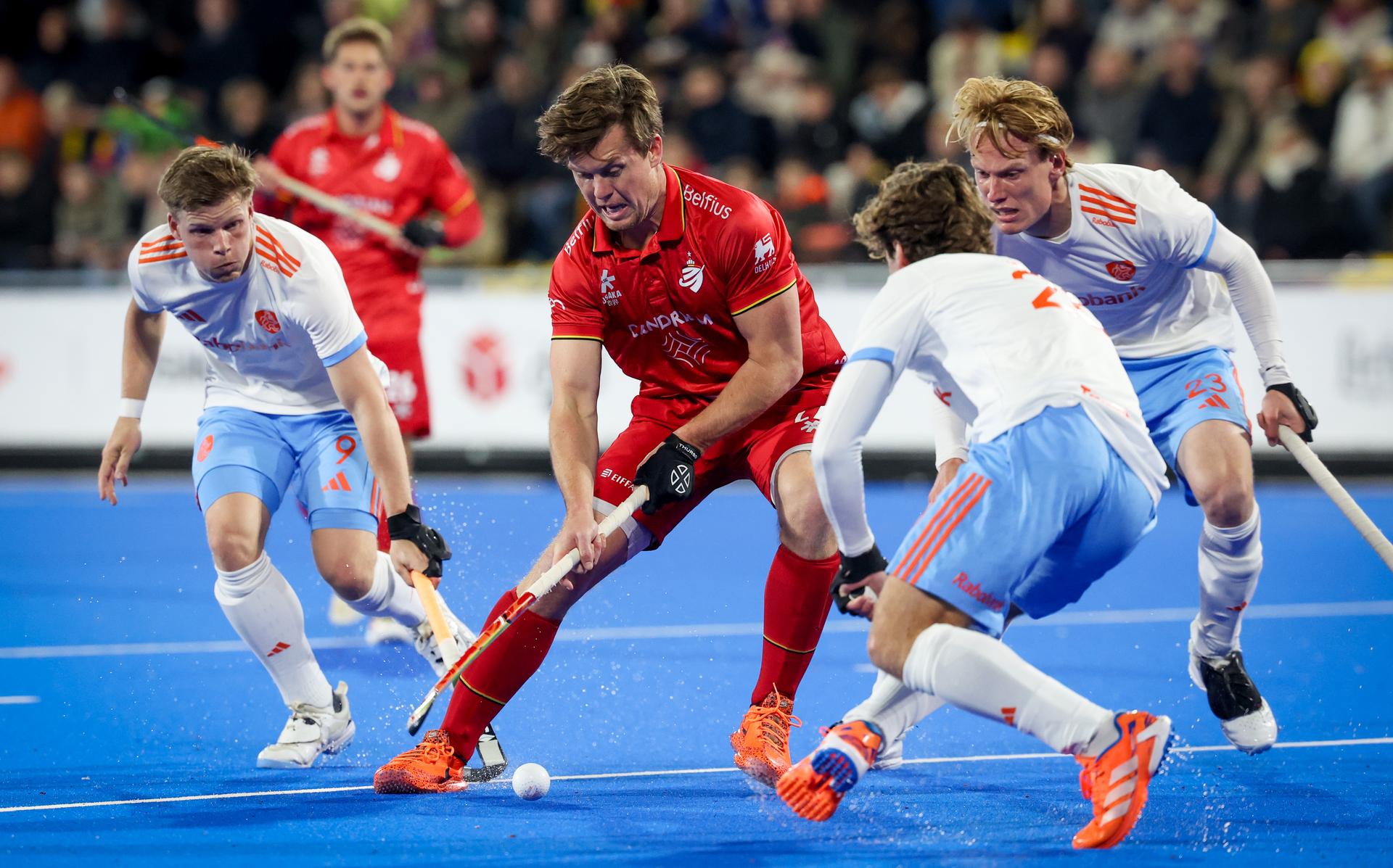 Belgium's Tom Boon and Netherlands' Joep de Mol fight for the ball during a friendly game between Belgium national men team Red Lions and The Netherlands, at the new Belfius Arena, in Wavre, Wednesday 01 April 2026. The stadium is the first facility of its kind in Belgium to be entirely dedicated to field hockey and will host the FIH Hockey World Cup 2026. BELGA PHOTO VIRGINIE LEFOUR