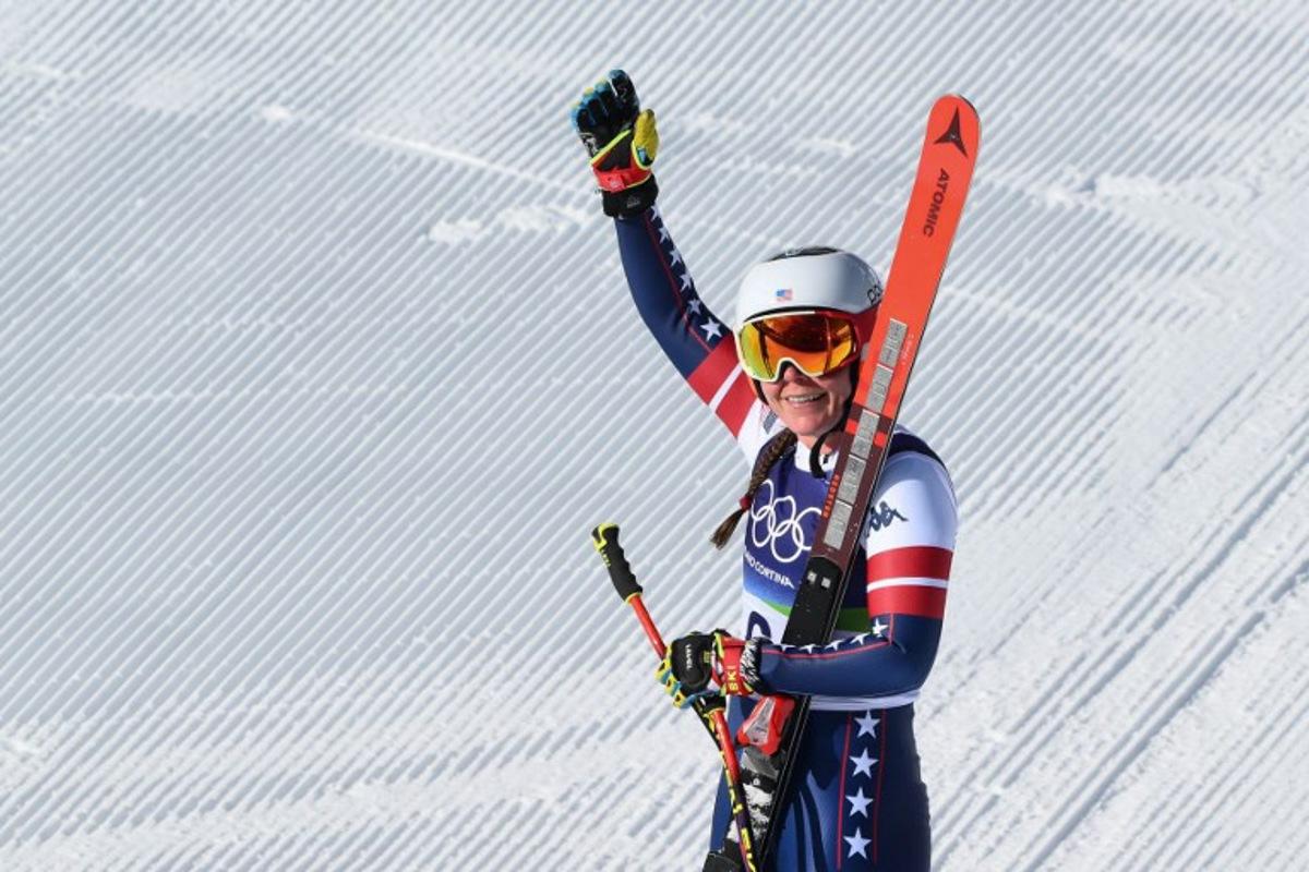 US' Breezy Johnson reacts in the finish area of the women's downhill event during the Milano Cortina 2026 Winter Olympic Games at the Tofane Alpine Skiing Centre in Cortina d'Ampezzo on February 8, 2026.  Marco BERTORELLO / AFP