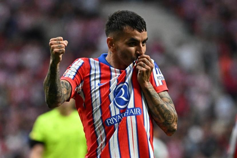 Atletico Madrid's Argentine forward #10 Angel Correa celebrates scoring his team's fourth goal during the Spanish league football match between Club Atletico de Madrid and Real Betis at Metropolitano Stadium in Madrid on May 18, 2025.  JAVIER SORIANO / AFP