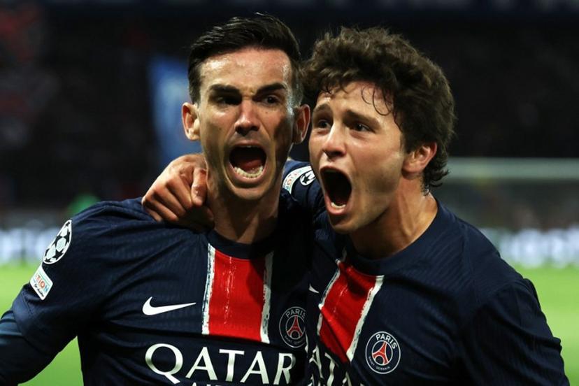 Paris Saint-Germain's Spanish midfielder #08 Fabian Ruiz (L) celebrates with his teammate Paris Saint-Germain's Portuguese midfielder #87 Joao Pedro Goncalves Neves (R) after scoring his team's first goal during the UEFA Champions League semi-final second leg football match between Paris Saint-Germain (PSG) and Arsenal at the Parc des Princes stadium in Paris, on May 7, 2025.  Thomas SAMSON / AFP