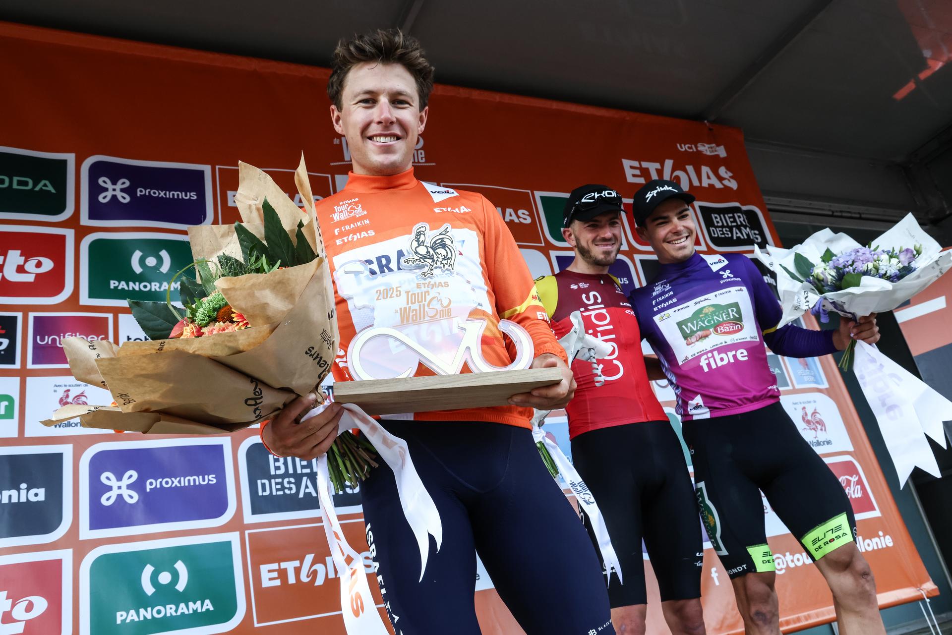 New Zealander Corbin John Strong of Israel-Premier Tech celebrates after the fifth and final stage of the Tour De Wallonie cycling race, from and back of Bertrix (183,3 km), on Wednesday 30 July 2025. BELGA PHOTO BRUNO FAHY