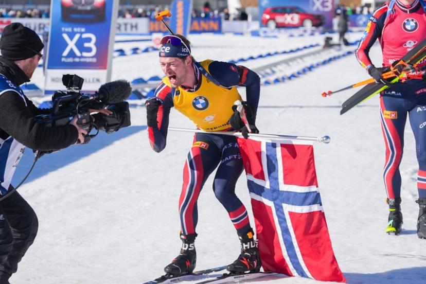 Winner Norway's Sturla Holm Laegreid celebrates after the men's 12.5 km pursuit of the IBU Biathlon World Cup in Holmenkollen, near Oslo, Norway, on March 22, 2025.  Terje Pedersen / NTB / AFP