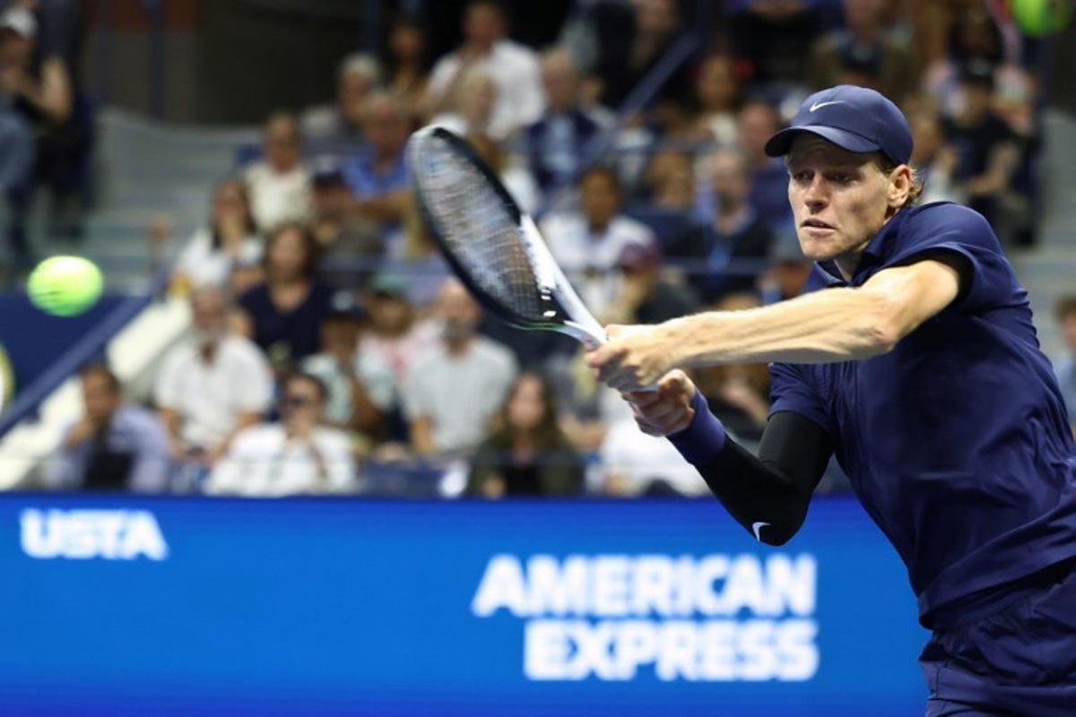 Italy's Jannik Sinner plays a forehand return to Kazakhstan's Alexander Bublik during their men's singles round of 16 tennis match on day nine of the US Open tennis tournament at the USTA Billie Jean King National Tennis Center in New York City, on September 1, 2025.  CHARLY TRIBALLEAU / AFP