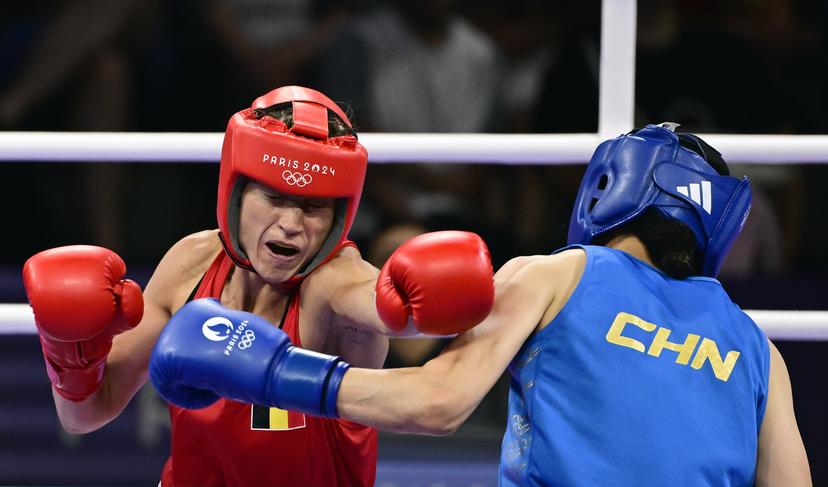Chinese boxer Liu Yang (blue) and Belgian boxer Oshin Derieuw (red) pictured in action during a boxing bout between Belgian Derieuw and Chinese Yang, in the quarterfinal of the women's -66kg category at the Paris 2024 Olympic Games, on Saturday 03 August 2024 in Paris, France. The Games of the XXXIII Olympiad are taking place in Paris from 26 July to 11 August. The Belgian delegation counts 165 athletes competing in 21 sports. BELGA PHOTO DIRK WAEM