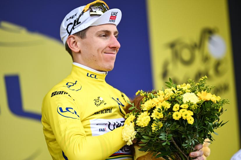 Slovenian Tadej Pogacar of UAE Team Emirates XRG celebrates on the podium in the yellow jersey of leader in the overall ranking after stage 20 of the 2026 Tour de France cycling race, a stage of 171km Le Bourg d'Oisans to Alpe d'Huez, on Saturday 25 July 2026. The 113th edition of the Tour de France starts on Saturday 4 July in Barcelona, Spain, and will finish in Paris, France on the 26th of July. BELGA PHOTO DAVID PINTENS