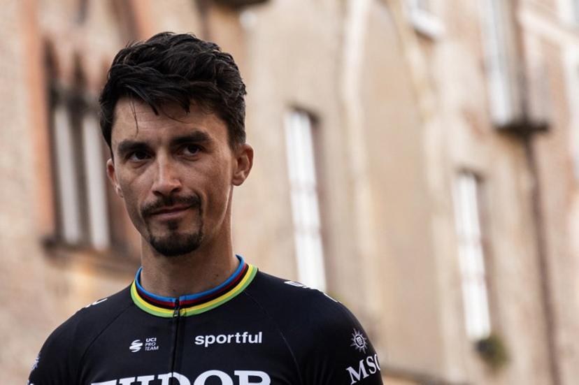 Tudor Pro Cycling Team's French Julian Alaphilippe attends the Teams presentation with teammates on the eve of the Milan - Sanremo one-day classic cycling race, in Pavia, on March 20, 2026.  MARCO BERTORELLO / AFP