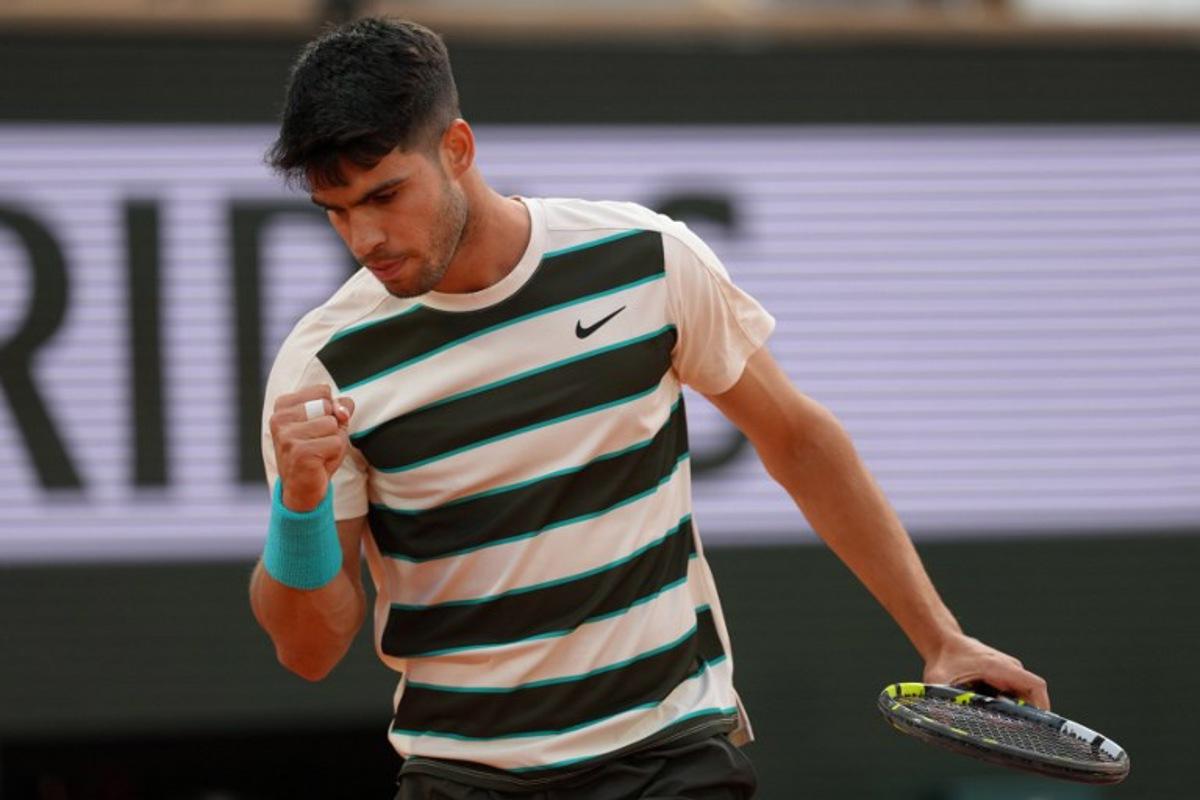 Spain's Carlos Alcaraz reacts to a point against US Tommy Paul during their quarter-final men's singles match on day 10 of the French Open tennis tournament on Court Philippe-Chatrier at the Roland-Garros Complex in Paris on June 3, 2025.  Dimitar DILKOFF / AFP