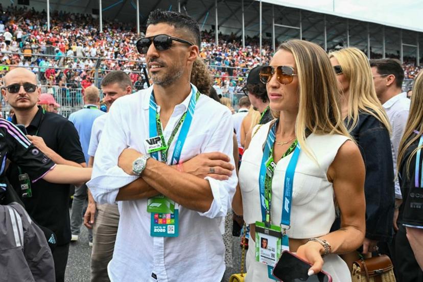 Inter Miami football player Uruguayan Luis Suarez and his wife Sofia Balbi tour the grid before the start of 2026 Miami Formula One Grand Prix at Miami International Autodrome in Miami Gardens, Florida, on May 3, 2026.  CHANDAN KHANNA / AFP