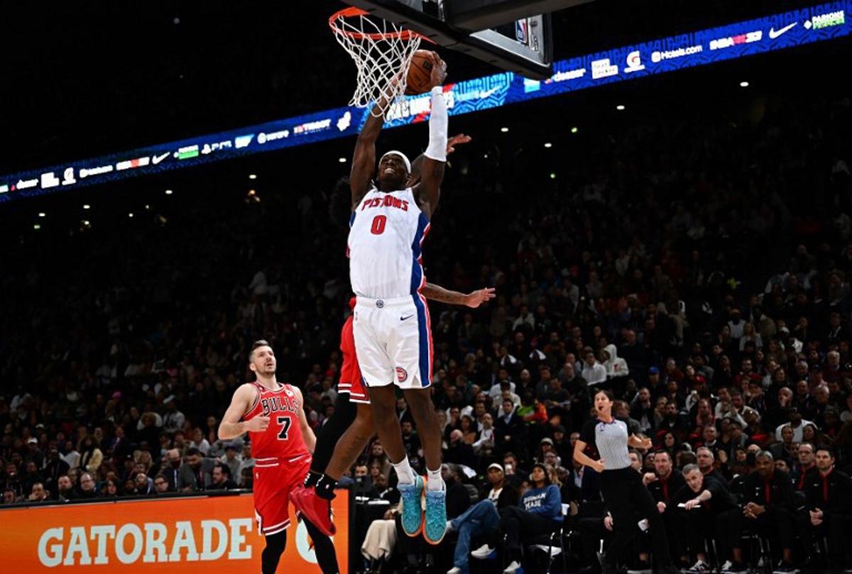 Detroit Pistons' US power forward Jalen Duren jumps to score during the 2023 NBA Paris Games basketball match between Detroit Pistons and Chicago Bulls at the Arena stadium in Paris on January 19, 2023.  Anne-Christine POUJOULAT / AFP