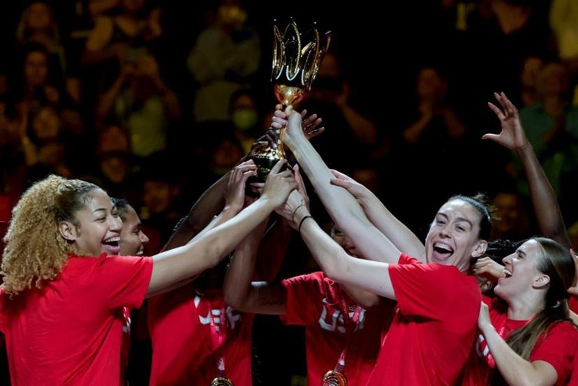 Team USA celebrate with the trophy after the 2022 FIBA Women's Basketball World Cup final match between China and the USA at the Superdome on October 1, 2022, in Sydney.   Andy Cheung / AFP