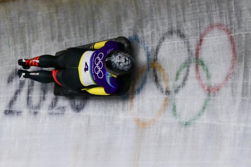 Belgium's Kim Meylemans competes in the skeleton women's heat 2 at Cortina Sliding Centre during the Milano Cortina 2026 Winter Olympic Games in Cortina d'Ampezzo on February 13, 2026.  Stefano RELLANDINI / AFP