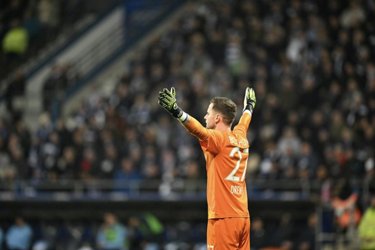 Bochum's German goalkeeper #27 Patrick Drewes gestures during the German first division Bundesliga football match between VfL Bochum and Bayer Leverkusen in Bochum on November 9, 2024.  INA FASSBENDER / AFP