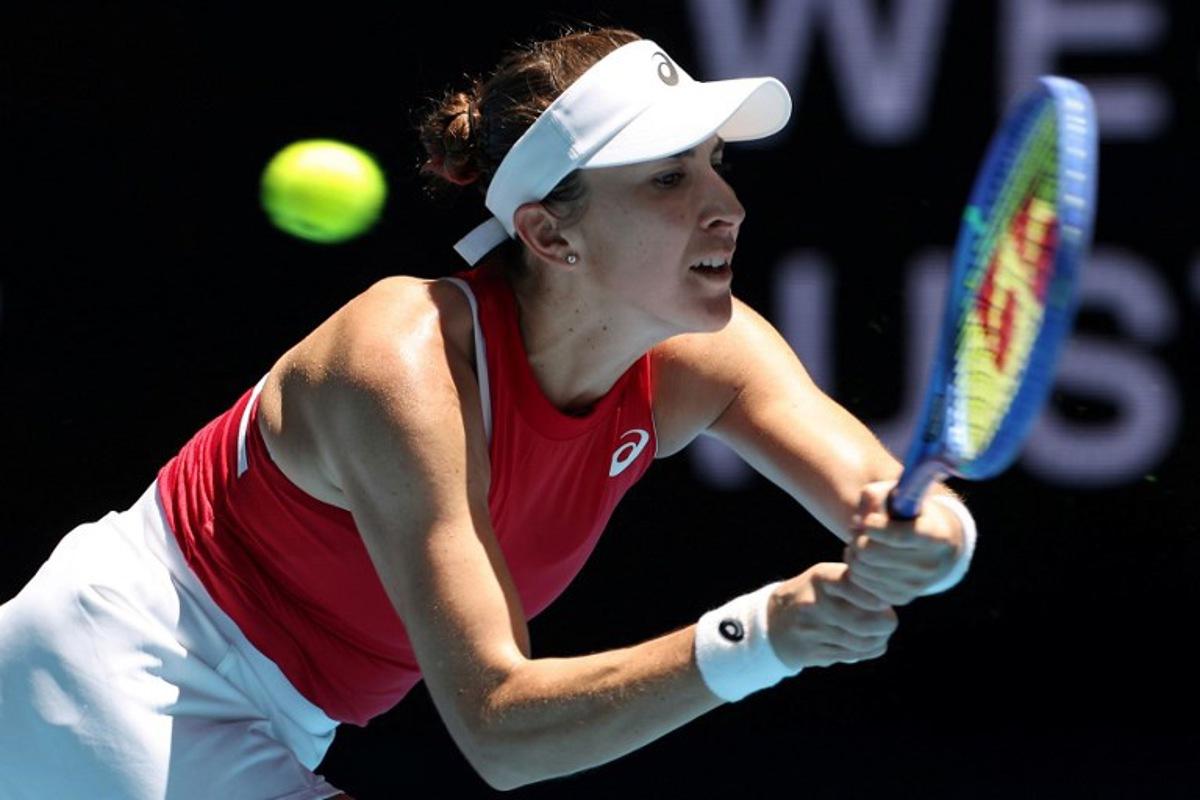 Switzerland's Belinda Bencic hits a return to France's Lois Boisson during their women's singles match at the United Cup tennis tournament in Perth on January 3, 2026.   COLIN MURTY / AFP