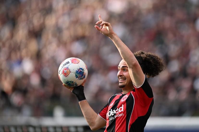 Frankfurt's Belgian defender #03 Arthur Theate gestures with the ball during the German first division Bundesliga football match between Eintracht Frankfurt and RB Leipzig in Frankfurt am Main, western Germany, on April 18, 2026.  Kirill KUDRYAVTSEV / AFP