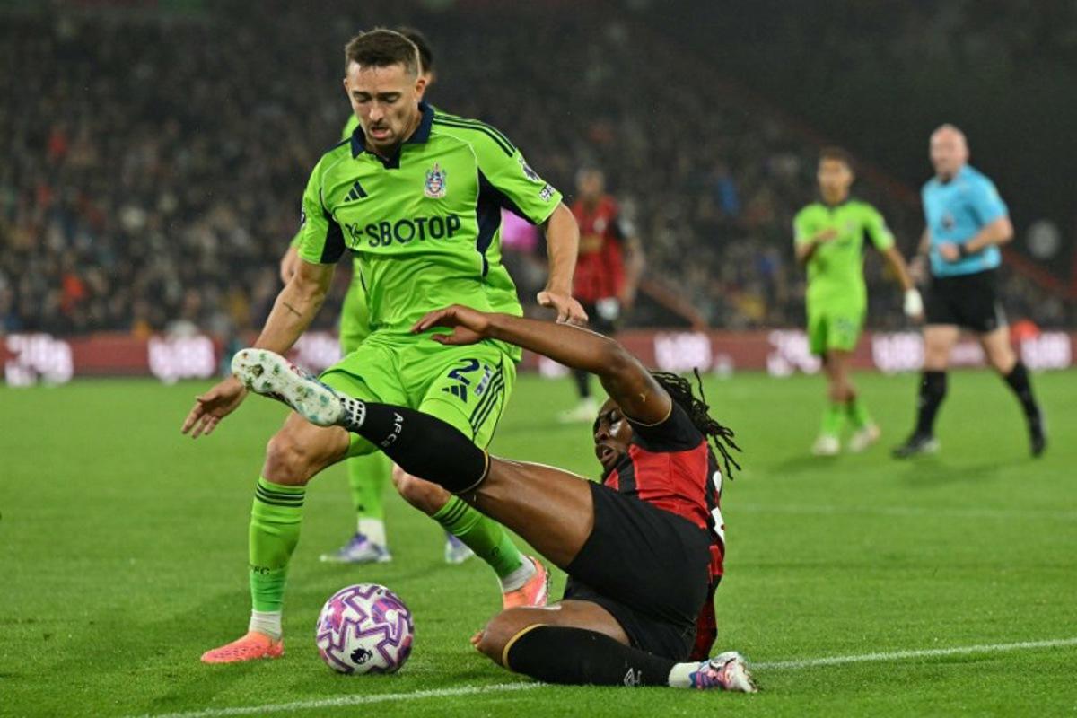 Fulham's Belgian defender #21 Timothy Castagne (L) vies with Bournemouth's Ghanaian striker #24 Antoine Semenyo (R) during the English Premier League football match between Bournemouth and Fulham at the Vitality Stadium in Bournemouth, southern England on October 3, 2025.  Glyn KIRK / AFP