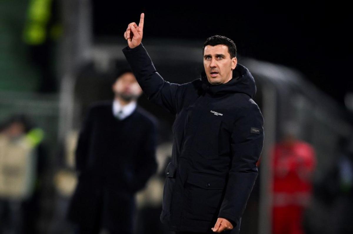 AZ Alkmaar's Belgian coach Maarten Martens gestures from the sidelines during the UEFA Europa League football match between Ludogorets and AZ Alkmaar at Huvepharma Arena in Razgrad on December 12, 2024.  Nikolay DOYCHINOV / AFP