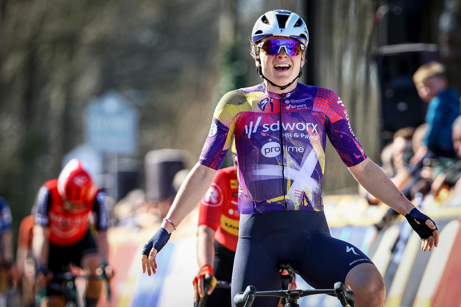 Polish Marta Lach of SD Worx-Protime celebrates as she crosses the finish line to win the 'Nokere Koerse' one day cycling race for women elite, 134km from Deinze to Nokere, on Wednesday 19 March 2025. BELGA PHOTO DAVID PINTENS