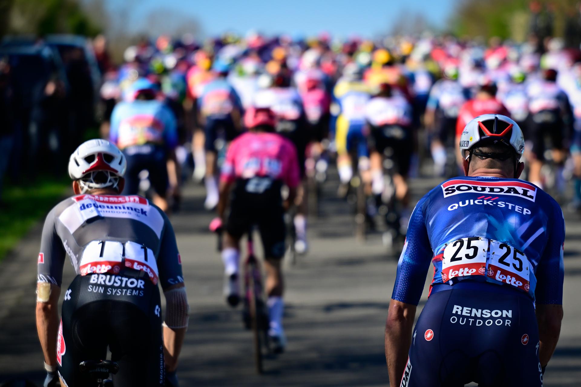 Belgian Jasper Philipsen of Alpecin-Deceuninck and Belgian Bert Van Lerberghe of Soudal Quick-Step pictured in action during the 'Classic Brugge-De Panne' men's elite one-day cycling race, 195,6 km from Brugge to De Panne, Wednesday 26 March 2025. BELGA PHOTO DIRK WAEM