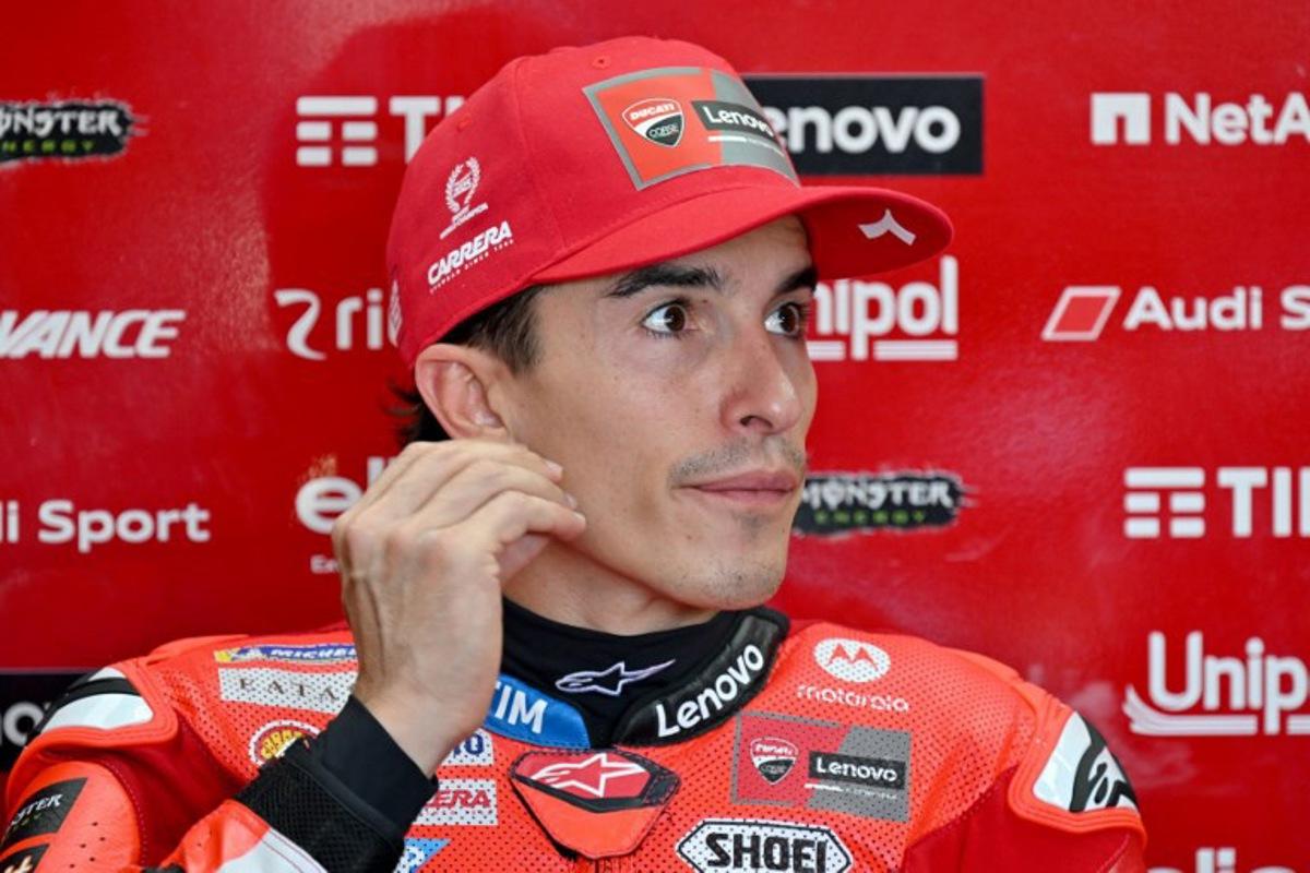 Ducati Lenovo Team's Spanish MotoGP rider Marc Marquez prepares for the free practice ahead of the MotoGP Indonesian Grand Prix at the Mandalika International Circuit in Mandalika, West Nusa Tenggara on October 3, 2025.  SONNY TUMBELAKA / AFP