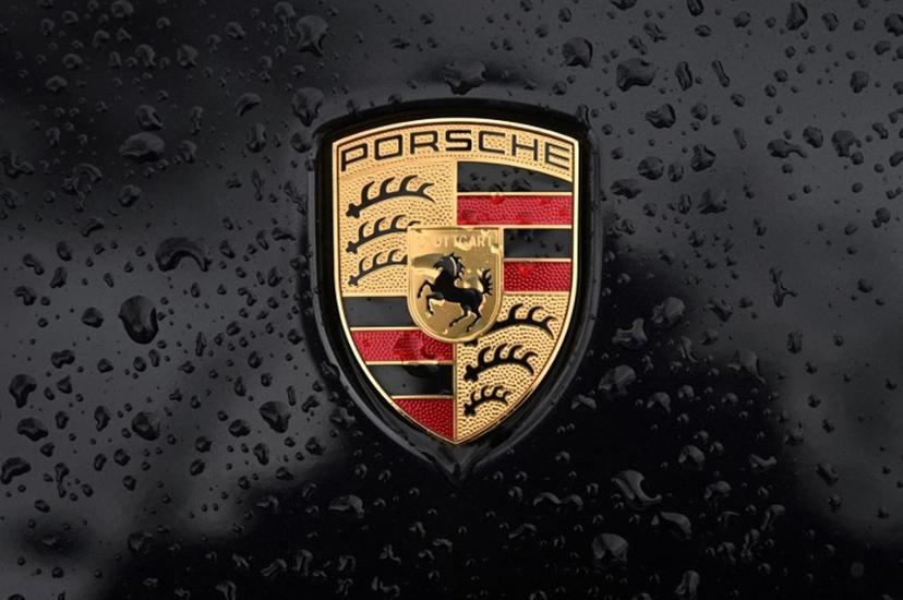 This photographgraph taken on January 10, 2023 shows the logo of German car manufacturer Porsche, in Paris.  Emmanuel DUNAND / AFP