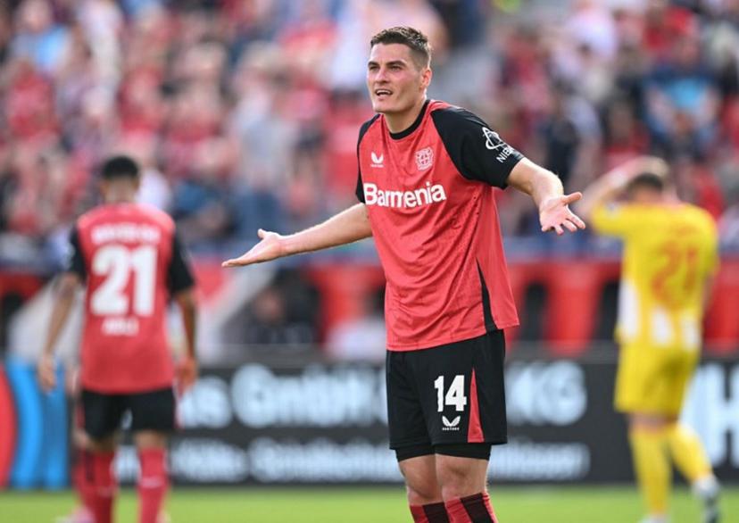 Bayer Leverkusen's Czech forward #14 Patrik Schick reacts during the German first division Bundesliga football match between Bayer Leverkusen and Union Berlin in Leverkusen, western Germany, on April 12, 2025.  INA FASSBENDER / AFP