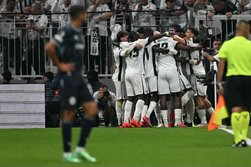 Besiktas' players celebrate their team's first goal during the UEFA Europa League first round 1 day 1 football match between Besiktas and Olympique de Marseille (OM) at Besiktas Tupras Stadium in Istanbul, on September 17, 2026.  Ozan KOSE / AFP
