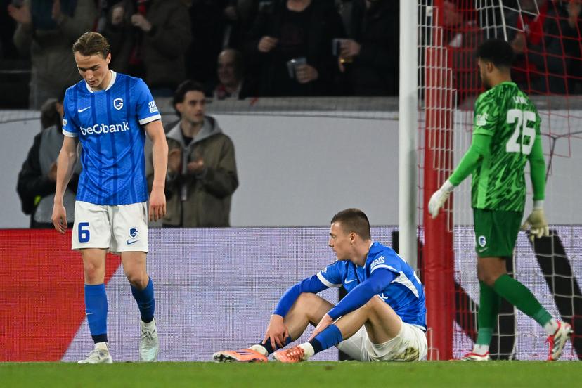 Genk's Matte Smets, Genk's Daan Heymans and Genk's goalkeeper Tobias Lawal look dejected during a soccer game between German Sport-Club Freiburg and Belgian KRC Genk in Freiburg im Breisgau, Germany on Thursday 19 March 2026, the return leg of the 1/16 Finals of the UEFA Europa League tournament. Genk won the first leg 1-0. BELGA PHOTO JILL DELSAUX
