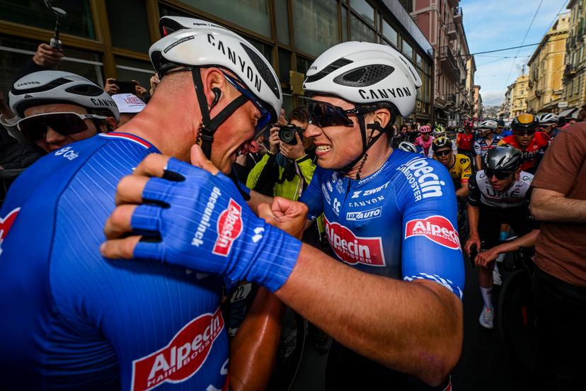 Dutch Mathieu van der Poel of Alpecin-Deceuninck and Belgian Jasper Philipsen of Alpecin-Deceuninck celebrate after winning the 'Milano-Sanremo' one day cycling race, 294km from Milan to Sanremo, Italy, Saturday 18 March 2023. BELGA PHOTO POOL DARIO BELINGHERI