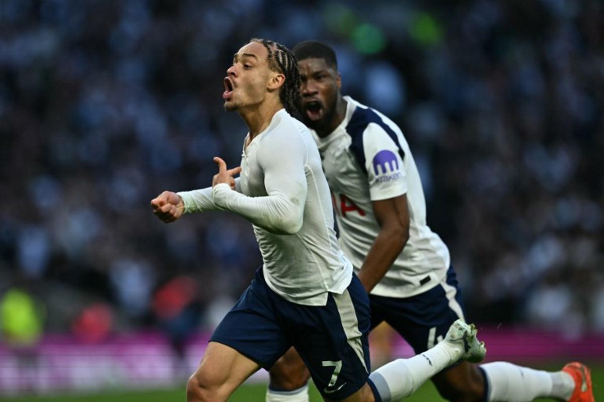 Tottenham Hotspur's Dutch midfielder #07 Xavi Simons (L) celebrates after scoring their second goal during the English Premier League football match between Tottenham Hotspur and Brighton and Hove Albion at the Tottenham Hotspur Stadium in London, on April 18, 2026.  Ben STANSALL / AFP