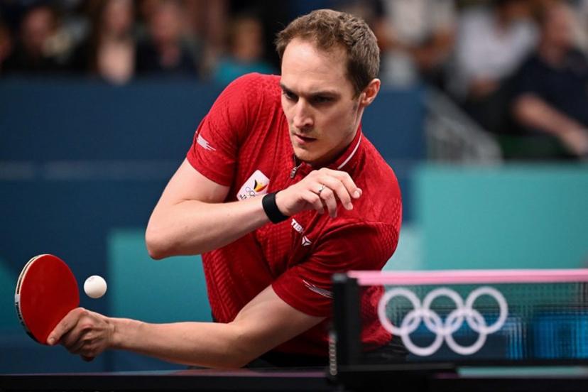 Belgium's Cedric Nuytinck plays a return against Sweden's Truls Moregard during their men's table tennis singles round of 64 at the Paris 2024 Olympic Games at the South Paris Arena in Paris on July 27, 2024.  JUNG Yeon-je / AFP