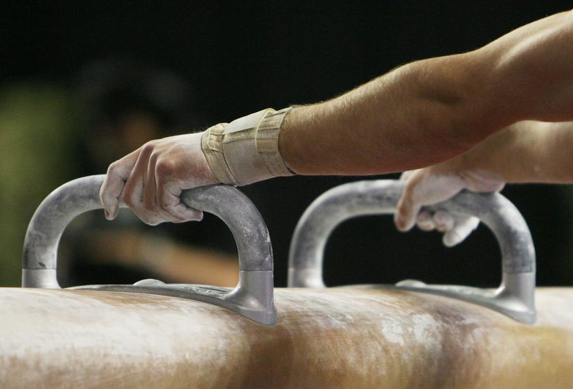 20070513 - GENT, BELGIUM : Illustration picture shows a close up on the hands of an athlete competing the vault men final of the World Cup Gymnastics at Gent's topsporthal, Sunday 13 June 2007, Belgium.  BELGA PHOTO ERIC LALMAND
