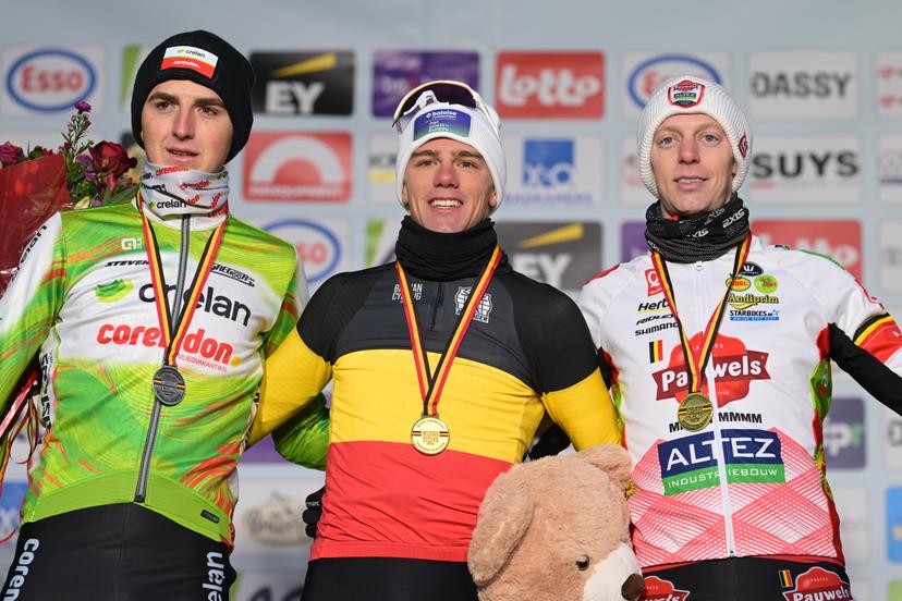 Belgian Emiel Verstrynge, Belgian Thibau Nys and Belgian Michael Vanthourenhout celebrate on the podium after the Elite men race at the Belgian Cyclocross Championships in Beringen on Sunday 11 January 2026. BELGA PHOTO DAVID PINTENS
