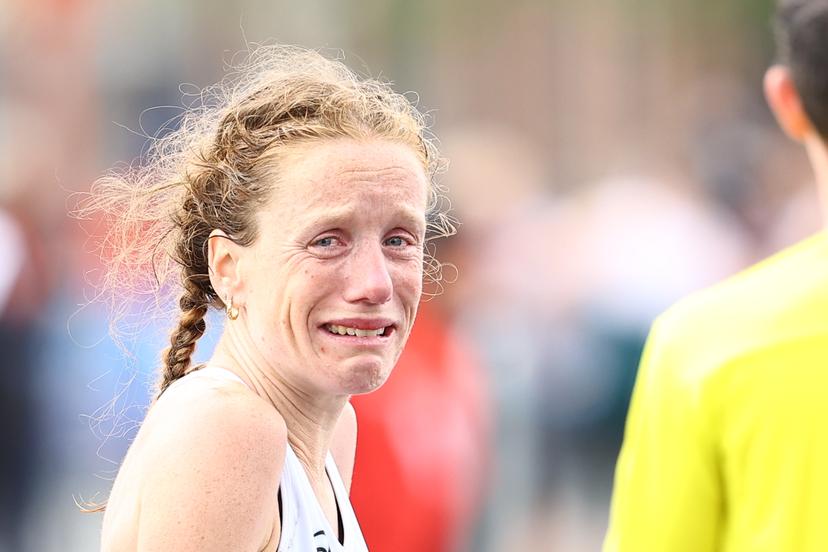 Belgian Hanne Verbruggen reacts after finishing 12th at the women marathon race at European Running Championships, from Leuven to Brussels, Sunday 13 April 2025.  BELGA PHOTO DAVID PINTENS
