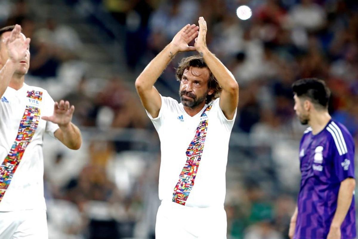 Fifa Legend's Italian midfielder Andrea Pirlo (C) celebrates after scoring during the 'Game of Legends' exhibition friendly football game between the 'Legends of Mexico' and 'FIFA International Legends', at BBVA Stadium in Monterrey, Nuevo Leon state, Mexico, on September 20, 2024.  Julio Cesar AGUILAR / AFP