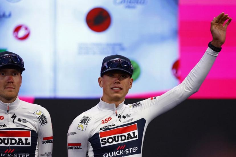 Soudal Quick-Step French rider Paul Magnier waves during the team presentation in Burgas, on May 6, 2026, two days before the departure of the Giro d'Italia 2026 - Tour of Italy cycling race. The Giro d'Italia 2026 will depart from Burgas in Bulgaria on May 8, 2026 and finish in Rome on May 31, 2026. Luca Bettini / AFP